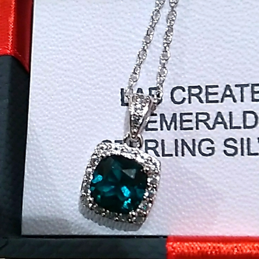 Emerald sterling silver white sapphire necklace